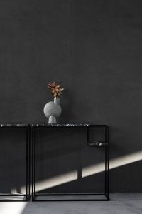 Kaboompics - Dark mood aesthetics - furniture - black wall