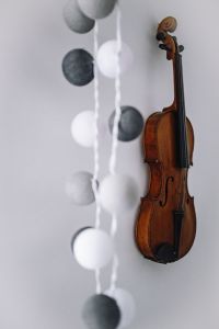 Violin on a white wall
