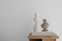 Kaboompics - Stoneware candle holder - ceramic - rounded shape - home decoration - book