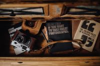 Kaboompics - Books in a drawer & Vintage camera