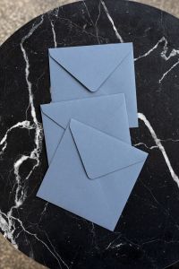 Kaboompics - Blue envelopes on marble