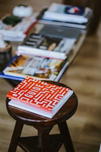 Kaboompics - Magazines on a table and stool
