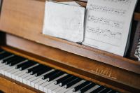 Kaboompics - Old piano with sheet music