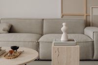 Travertine coffee table and greige linen couch