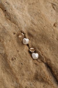 Simplicity by the Sea - Minimalist Jewelry on Malta's Rocky Beach