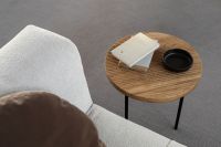 Kaboompics - Wooden fluted table - books - light beige sofa - oak - boucle