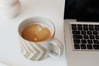 Kaboompics - Laptop & cup of coffee on marble table