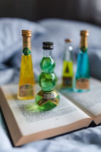 Group of colorful little bottles with liqueurs