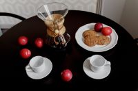 Kaboompics - Breakfast served with coffee, cookies and plums