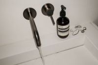 Kaboompics - Clean Aesthetics: Serene Bathroom Ambiance with Luxury Skincare Products