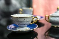 Kaboompics - White and blue teacups with saucers