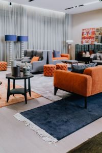 Kaboompics - Modern luxury furniture in showroom store, armchairs, sofa. table, laps, rugs