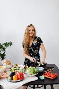 Kaboompics - Teen Girl makes a salad