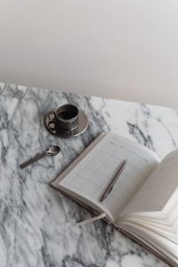Coffee in a steel cup - Calendar - Arabescato marble - Metal spoon