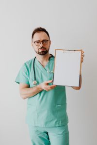 Kaboompics - Doctor with stethoscope and clipboard