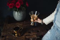 Kaboompics - Enjoying a finely brewed coffee, gold coffee cup & red roses