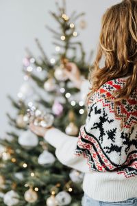Kaboompics - Woman Decorate Christmas Trees