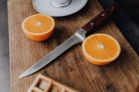 Knife, waffle, oranges