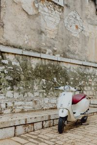 Kaboompics - Scooter parked by an old stone building, Rovinj, Croatia