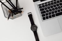 Kaboompics - Black watch and Macbook laptop
