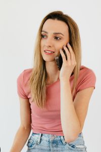 Kaboompics - Young woman talking by mobile phone