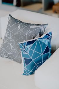 Kaboompics - Scandinavian decorative pillows on modern sofa