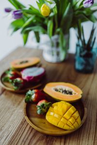 Kaboompics - Exotic fruits on a wooden table
