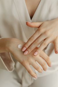 Kaboompics - Moisturizing Hands with Nourishing Cream