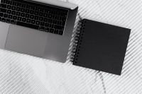 Kaboompics - blackbook & laptop on marble