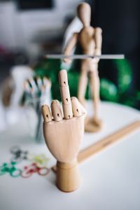 Wooden hand doing gesture