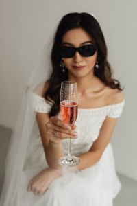 Kaboompics - Wedding - Bride - Portrait - Veil - Glass of Champagne - Sunglasses
