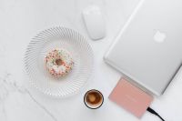 Kaboompics - Macbook Laptop, donuts & coffee