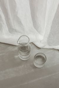 Kaboompics - Pure water - glass jug with a natural design - naturally shaped glass tumbler