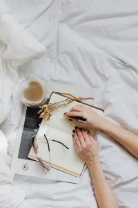 Kaboompics - Notepad - Glasses - Bedding - Coffee - Hands