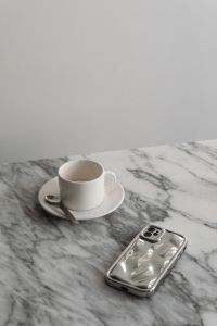 Coffee in a cup - Arabescato marble - Metal spoon - Silver iPhone Case