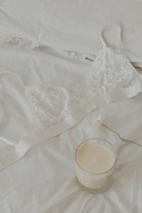 Kaboompics - White lace triangle bra - white candle