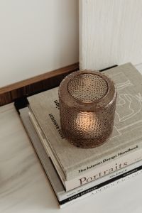 Kaboompics - Ceramic lamp styled on a commode with a stone top