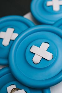 Close-ups of big blue plastic buttons