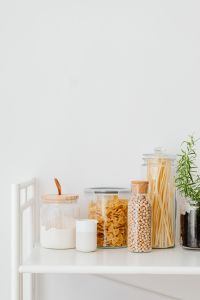Kaboompics - Farfalle, spaghetti pasta in jars, wheat flour, rosemary and chickpeas