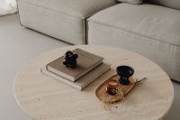 Travertine coffee table and greige linen couch