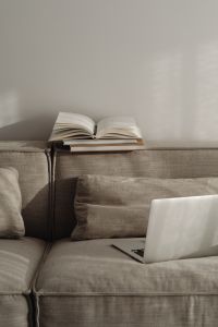 Kaboompics - Home office on the sofa - books - notebook - organizer - planner - laptop