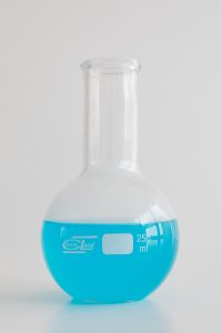 Flat-bottomed flask wiith blue liquid