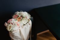 Bouquet of flowers in a bag with some fairy lights