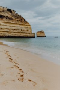 Kaboompics - Footprints on a sandy beach, Portugal