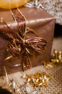 New Year's Eve party - closeup of gift with ribbon