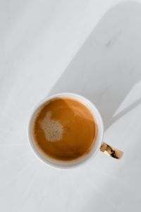 Kaboompics - Cup of coffee on white marble