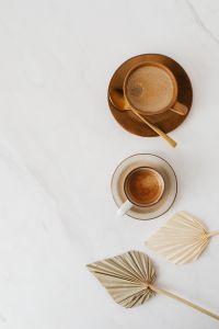 Coffee & Dried Palm Leaves on Marble