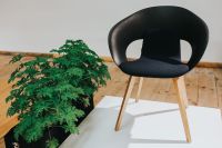 Kaboompics - Various designer chairs and tables on an exhibition