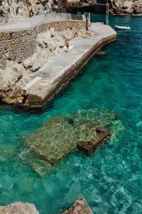 Kaboompics - People sunbathing at the turquoise sea water