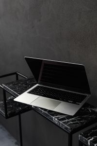 Kaboompics - Macbook Pro laptop - marble - decorative plaster on wall - black aestheticsMacbook Pro laptop - marble - decorative plaster on wall - black aesthetics